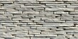 © Views & Backgrounds - Striped gray stone wall, stacked natural rock exterior cladding , wall covering, stripes