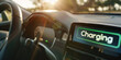 © Eyepain - Dashboard screen show charging display electricity control console wheel and warm sunlight form windows green energy concept.