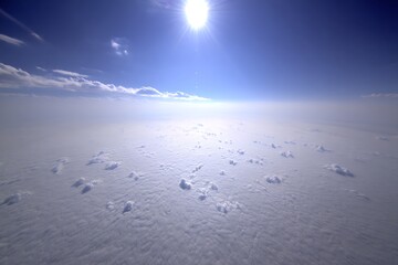 Wall Mural - sun above a sea of clouds