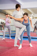 © JackF - Women learn to hit the knee in the corpus, in self-training training. European women learn punches and blocks
