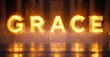 © antishock - Illuminated GRACE sign reflects upon water. Dramatic lighting creates warm, ethereal mood. Columns visible background.