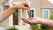 © AMA  - real estate agent holding keys