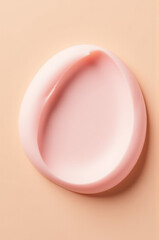 Poster - Close-up view of a pink object on a beige surface, suitable for use in product or lifestyle photography