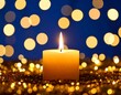 © Jaya - Candle in golden bokeh