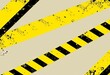 © Pimchada - Grunge yellow black striped hazard warning background vector frame, graphic, hazard sign