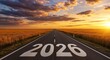 © Cleverson - A long road stretches into the distance, with the year 2026 emblazoned on the asphalt, symbolizing the journey ahead under a vibrant sunset.