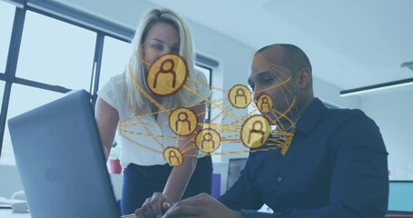 Poster - Woman pointing at laptop and man typing activating rotating network graphic for business teamwork