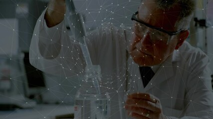 Poster - Senior scientist aligning lab beakers then pipetting yellow solution into vial for sampling