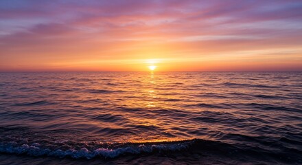 Wall Mural - sunset casting a golden path on gentle ocean waves
