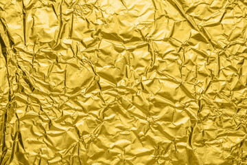 Wall Mural - luxury shiny metallic golden foil crumpled texture background