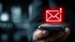 © Anca - Digital Alert: A close-up shot shows a hand holding a smartphone with a glowing, neon red email notification, signifying an urgent message.