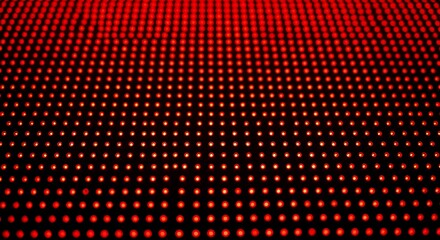 Poster - A close up of a red background with many small red dots