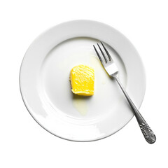 Poster - slice of yellow butter on white plate with silver fork, creating simple yet elegant presentation. image evokes sense of minimalism and culinary delight