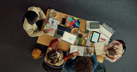Poster - Studying, group and exchanging notes in library, above and students with tech for knowledge and app. Education, people and learning for exam in university, planning and preparing test with books