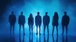 © Johannes - Eight people stand in silhouette against a blue light, creating a dramatic and mysterious image