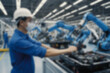 © Adi - A blurry car factory, vehicle spare parts production using sophisticated tools, a worker makes spare parts assisted by a sophisticated and modern robot hand, with a blurry car factory background.