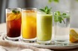 © Anat art - Refreshing Lineup of Healthy Alternative Drinks Featuring Herbal Tea, Smoothie, and Purified Water Ready to Energize During a Sunny Afternoon