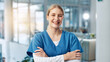 © peopleimages.com - Arms crossed, medical and portrait of woman nurse in hospital for about us, service and confidence. Happy, healthcare and scrubs with friendly medicine professional in clinic for medicare or therapy