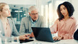 © peopleimages.com - Boardroom, collaboration and woman with laptop, discussion and investment idea on website or online. Corporate, financial analyst and people with tech for opportunity, talking or research for meeting