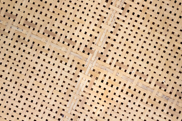 Wall Mural - Brown weaving bamboo wood on background