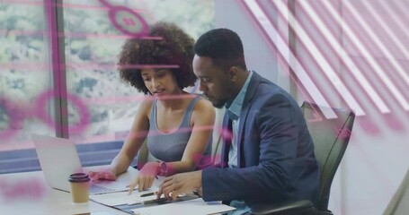 Poster - woman pointing to chart initiating business analysis while man writing notes and viewing visuals