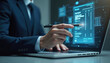 © miss irine - Business pro uses stylus to access digital invoice on laptop. Man in suit, working with online billing interface. Tech, finance, accounting, business, digital invoice concept.