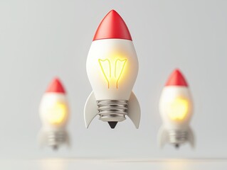 Poster - business bright idea concept. Brightly lit rocket lamps in various sizes against a plain background.