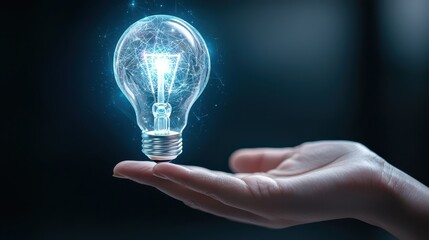 Poster - business bright idea concept. A hand holds a glowing light bulb, symbolizing creativity and innovative ideas.