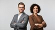 © Shrat - Two confident business partners, a man and a woman, stand back to back with arms crossed, exuding professionalism and collaboration. A business duo embodying partnership, equality, and success.