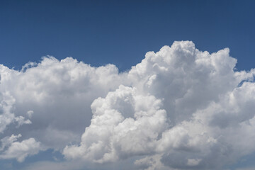 Wall Mural - blue sky with fluffy white close up clouds.. clouds background.