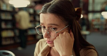 Aufkleber - Student, girl or stress with study in library for difficult assignment, exam preparation or deadline. University, gen z person and overwhelmed with reading information, academic pressure and confused