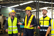 © NVB Stocker - Professional team working at workplace. Unity and teamwork concept. Group portrait engineer factory manager worker and mechanic team together in factory workplace