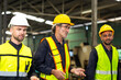 © NVB Stocker - Professional team working at workplace. Unity and teamwork concept. Group portrait engineer factory manager worker and mechanic team together in factory workplace
