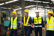 © NVB Stocker - Professional team working at workplace. Unity and teamwork concept. Group portrait engineer factory manager worker and mechanic team together in factory workplace