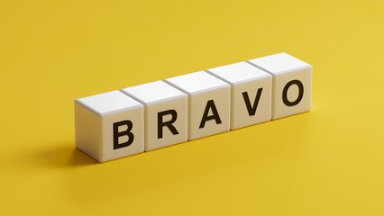 Poster - The word bravo appearing wooden cubes. Education concept.close up of wooden cubes,Business Concept.3D rendering on yellow background.
