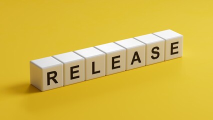 Poster - The word release written on wooden cubess. Business and finance concept.close up of wooden cubes,Business Concept.3D rendering on yellow background.