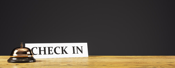 Poster - Hotel check-in desk with service bell and sign on wooden counter against dark background in modern hospitality reception interior concept. 3D Rendering