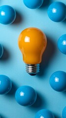 Poster - An outstanding orange light bulb stands out against a backdrop of vibrant blue spheres, creating a striking visual contrast that draws attention in any setting