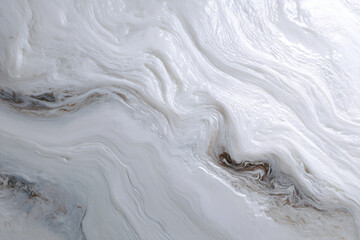 a close up of a marble surface with a black and white pattern