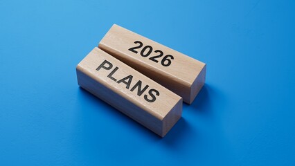 Poster - 2026 Plans word. Resolution, strategy, solution, goal, business and New Year holiday concepts. wooden blocks. Copy space.3D rendering on blue background.
