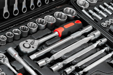 Poster - A toolbox with many tools including a wrench. The wrench is silver and has a black handle
