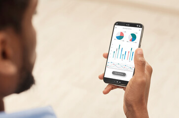 Aufkleber - Cropped of black man using analytics mobile app on smartphone, checking his incomes on trading stocks, panorama. Male hands holding phone with newest analytics mobile application