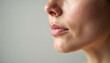 © Elena - Young woman’s face in profile showcasing healthy skin and emotions