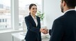 © Joa - Office worker shaking a hand