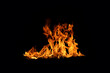 © WICHAI - Abstract flame isolated on black background. Burning effect. Close-up photo of flames.