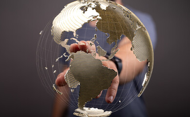 Leinwandbilder - Person's hand interacts with a digital globe, symbolizing global reach and connection.