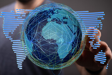 Fototapete - Hand interacting with a digital globe, showcasing global connectivity and data flow.