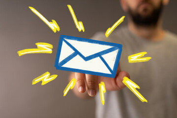 Poster - Hand holding digital email icon.  Modern communication, inbox, message.