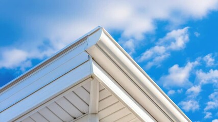 Aufkleber - A corner of a house with a blue sky in the background