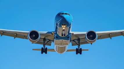 Poster - A commercial airliner soaring through a clear blue sky, ideal for use in travel or transportation concepts
